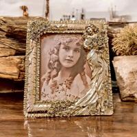 Ricca ed elaborata cornice portafoto 30x25