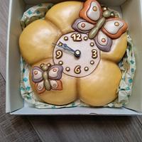 Orologio  da parete Thun.