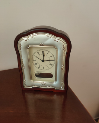 Orologio in legno e argento