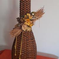 vaso in ferro battuto e rattan 