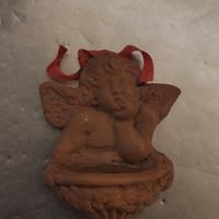 Mini acquasantiera angelo