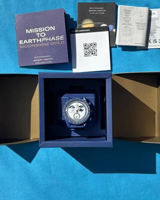 Omega X swatch mission to eartphase moonshine gold
