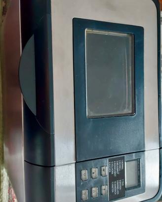 Macchina per preparare e cuocere il pane