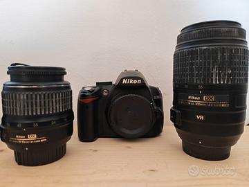 Nikon d3000 + Nikkor 18.55 + nikkor 55-300
