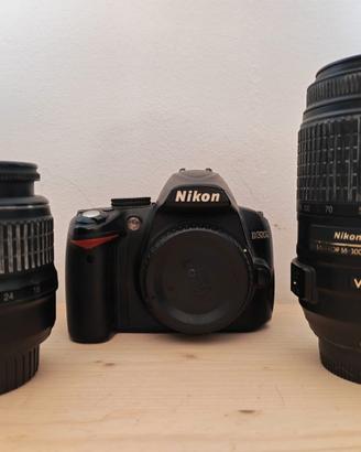 Nikon d3000 + Nikkor 18.55 + nikkor 55-300