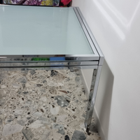 Tavolo cromato con vetro allungabile
