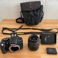 Nikon D3100 + Ottica Nikkor 18-55 AF-S + Accesori