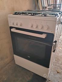 piano cottura a gas con forno elettrico 