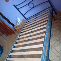 Rete in doghe con testiera letto