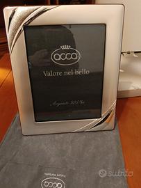 cornice in argento nuova