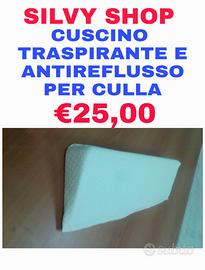 Cuscino antireflusso per culla