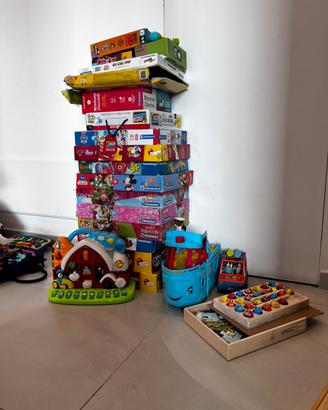 dono giocattoli bambini triciclo puzzle bing