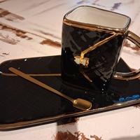 Tazza con piattino e cucchiaio