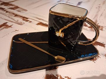 Tazza con piattino e cucchiaio