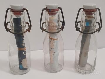 bottigliette in vetro con tappo vintage non aperte