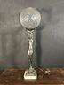 scultura-in-bronzo-con-lampada
