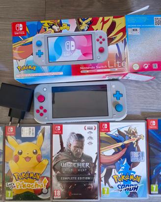 Switch lite limite edition+presa+sd 32gb+5 giochi