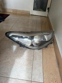 faro sx Kia Rio alogeno.