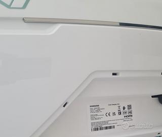 postazione F1 CON SEDILE E SCHERMO CURVO 49"