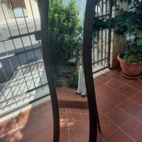 Specchio con cornice in legno