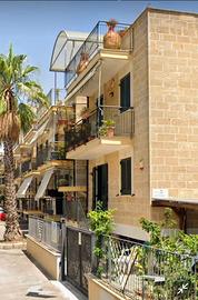 Appartamento con giardinetto pavimento posto auto