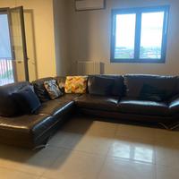 Divano angolare in pelle Natuzzi