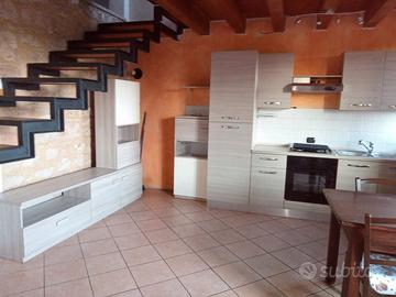 Bilocale con giardino