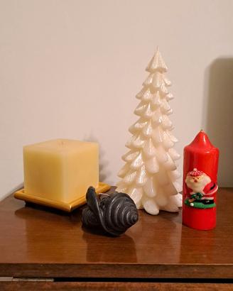 Candele decorative a tema natalizio