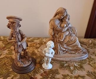 3 statue vecchie