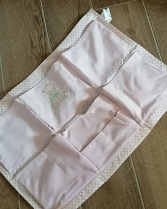 Porta oggetti da parete per neonato