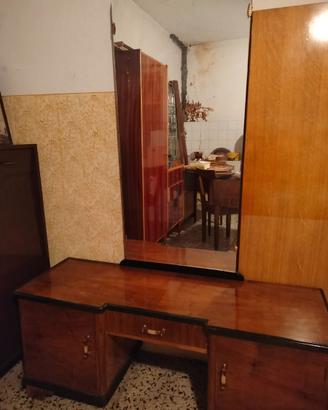 Toilette peteneuse anni 30