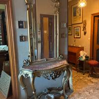 Consolle dorata a foglia oro