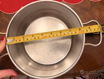 Pentola manici oro casseruola