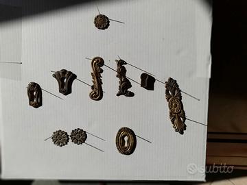 Gruppo per mobili di bronzetti  decorativi  vari -
