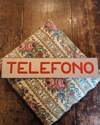 Insegna "Telefono"