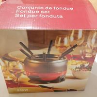 Set per fonduta Intertek. Mai usata