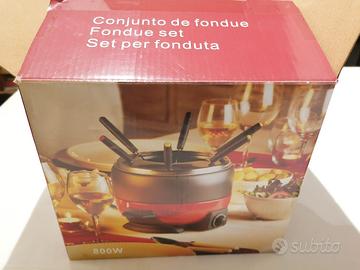 Set per fonduta Intertek. Mai usata