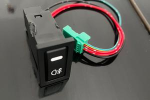 Pulsante  per faretti auto