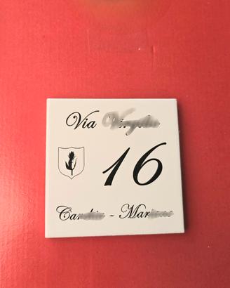 incisione su mattonella numero civico 