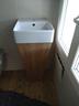 piccolo-bagno-in-rovere-con-struttura-incinata
