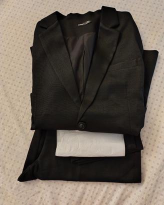 Completo uomo nuovo colore nero taglia XL