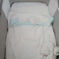 Piumino e copertina + culla con materassino