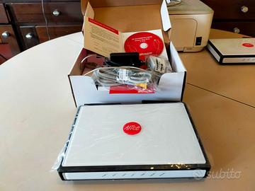 DUE MODEM ROUTER TELECOM ALICE GATE VoIP2PLUS WIFI