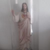 Statua sacra antica con campana vetro