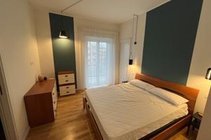 Stanza matrimoniale con balcone e bagno privato