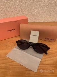 Occhiali da sole Miu Miu SMU 04Z