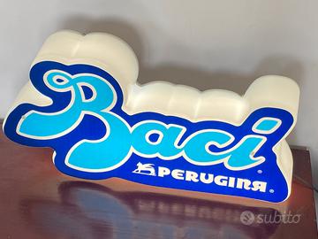 Insegna luminosa Baci Perugina