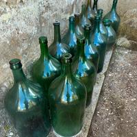 Damigiane in vetro verde d’epoca