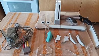 Console con accessori e videogiochi
