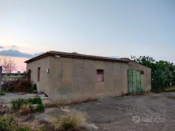 Terreno e casa rurale